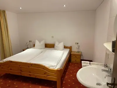 Ein Bett oder Betten in einem Zimmer der Unterkunft Haus Resi