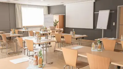 Ein Restaurant oder anderes Speiselokal in der Unterkunft JUFA Hotel Montafon