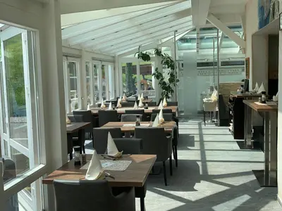 Ein Restaurant oder anderes Speiselokal in der Unterkunft Ferienwohnungen Fellhornblick
