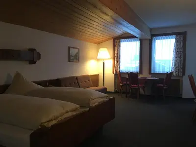 Ein Bett oder Betten in einem Zimmer der Unterkunft Hotel Garni