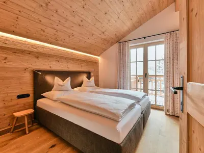 Ein Bett oder Betten in einem Zimmer der Unterkunft Omesberg-Hütt'n
