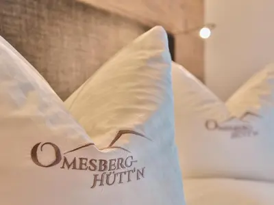 Ein Bett oder Betten in einem Zimmer der Unterkunft Omesberg-Hütt'n