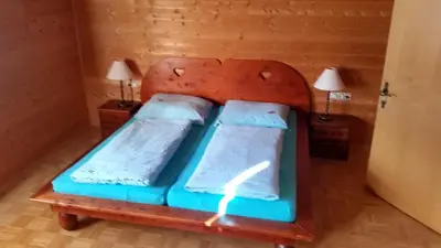 Ein Bett oder Betten in einem Zimmer der Unterkunft Klausberg-Hütte