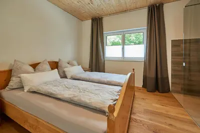 Ein Bett oder Betten in einem Zimmer der Unterkunft FEWO Hilbrand Dalaas
