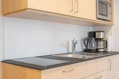 Küche/Küchenzeile in der Unterkunft Ferienwohnung Metzler - Blick auf die Berge