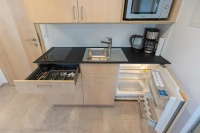 Küche/Küchenzeile in der Unterkunft Ferienwohnung Metzler - Blick auf die Berge