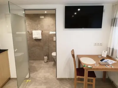 Ein Badezimmer in der Unterkunft Ferienwohnung Metzler - Blick auf die Berge