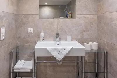 Ein Badezimmer in der Unterkunft Ferienwohnung Metzler - Blick auf die Berge