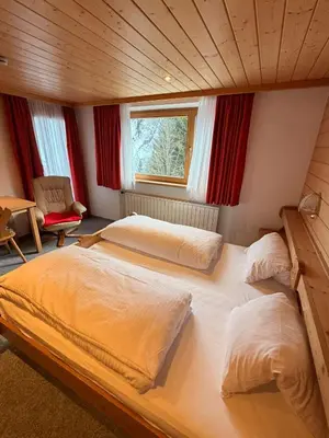 Ein Bett oder Betten in einem Zimmer der Unterkunft Damülser Horn