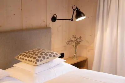 Ein Bett oder Betten in einem Zimmer der Unterkunft Pension Alpenfluh
