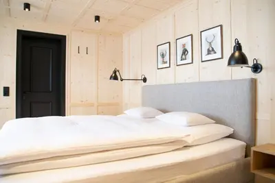 Ein Bett oder Betten in einem Zimmer der Unterkunft Pension Alpenfluh