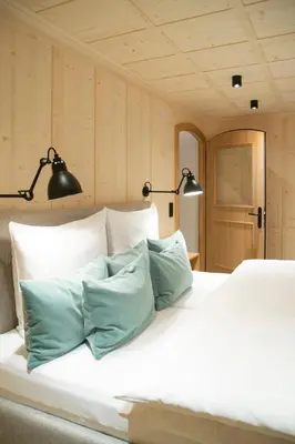 Ein Bett oder Betten in einem Zimmer der Unterkunft Pension Alpenfluh