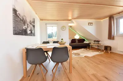 Ein Sitzbereich in der Unterkunft Bio-Bauernhof Heidegger