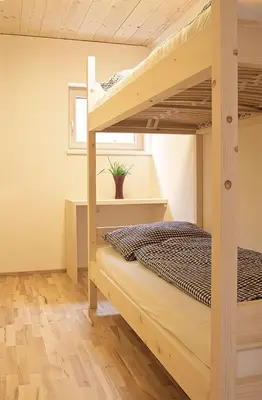 Ein Bett oder Betten in einem Zimmer der Unterkunft Ferienwohnung 