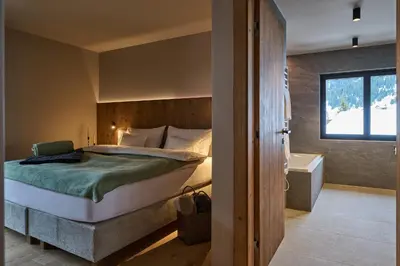Ein Bett oder Betten in einem Zimmer der Unterkunft Aparthotel Dorf570