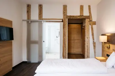Ein Bett oder Betten in einem Zimmer der Unterkunft Hotel Gasthof Lamm