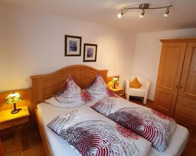 Ein Bett oder Betten in einem Zimmer der Unterkunft Gästehaus Marlies