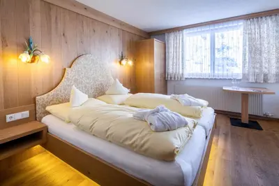 Ein Bett oder Betten in einem Zimmer der Unterkunft Hotel Anemone