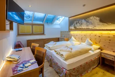 Ein Bett oder Betten in einem Zimmer der Unterkunft Hotel Anemone
