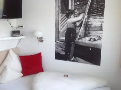 Ein Bett oder Betten in einem Zimmer der Unterkunft Hotel-Garni Fels
