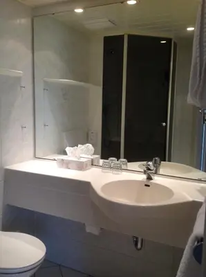 Ein Badezimmer in der Unterkunft Hotel-Garni Fels
