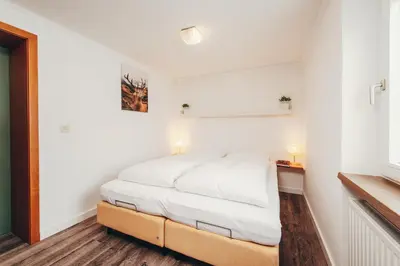 Ein Bett oder Betten in einem Zimmer der Unterkunft Haus Keti
