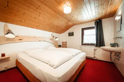 Ein Bett oder Betten in einem Zimmer der Unterkunft Haus Keti
