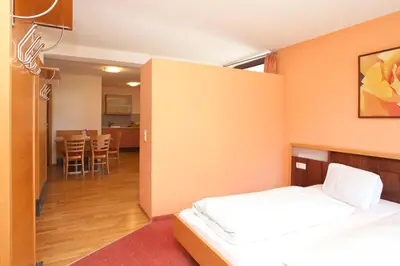 Ein Bett oder Betten in einem Zimmer der Unterkunft Gasthof Stern