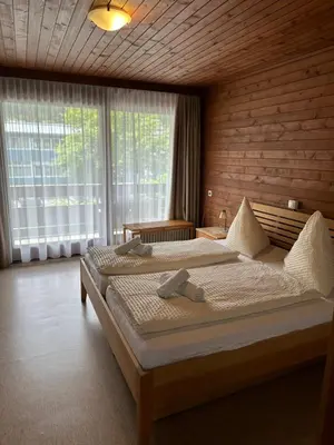 Ein Bett oder Betten in einem Zimmer der Unterkunft Gasthof Stern