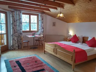 Ein Bett oder Betten in einem Zimmer der Unterkunft Ferienwohnungen Pension Sonnblick