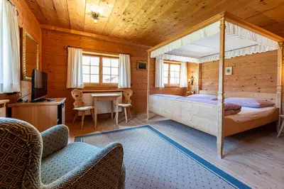 Ein Bett oder Betten in einem Zimmer der Unterkunft Gaemsle - Rueckzugsort in den Bergen