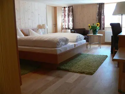 Ein Bett oder Betten in einem Zimmer der Unterkunft Gasthaus Engel