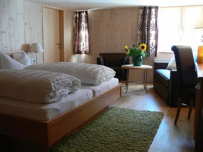 Ein Bett oder Betten in einem Zimmer der Unterkunft Gasthaus Engel