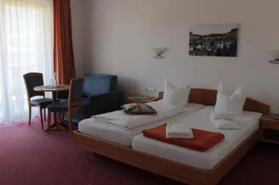 Ein Bett oder Betten in einem Zimmer der Unterkunft Gasthof Hirschen