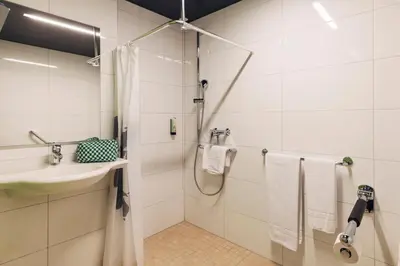 Ein Badezimmer in der Unterkunft harry's home Dornbirn hotel & apartments