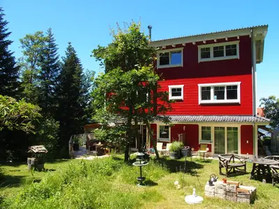 Ein Garten an der Unterkunft Schwedenhaus Eichenberg