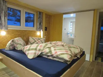 Ein Bett oder Betten in einem Zimmer der Unterkunft Haus Mittagspitze