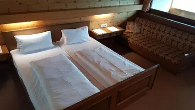 Ein Bett oder Betten in einem Zimmer der Unterkunft Gasthof Hotel IFENBLICK