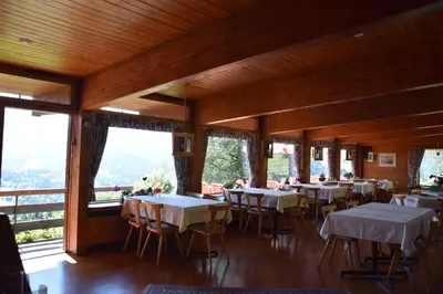 Ein Restaurant oder anderes Speiselokal in der Unterkunft Gasthof Hotel IFENBLICK