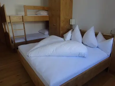 Ein Bett oder Betten in einem Zimmer der Unterkunft Ferienwohnung Oberdamüls
