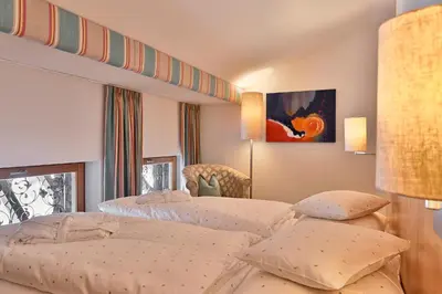 Ein Bett oder Betten in einem Zimmer der Unterkunft Hotel Petersboden
