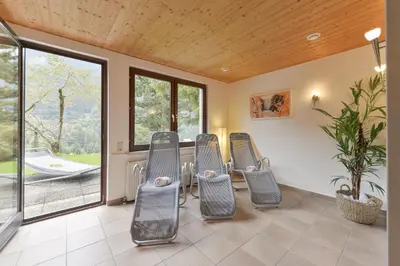 Ein Sitzbereich in der Unterkunft Hotel Sonnblick