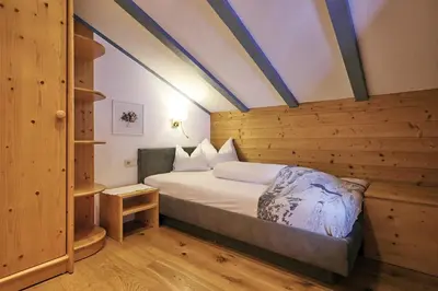 Ein Bett oder Betten in einem Zimmer der Unterkunft Fürmesli Appartements