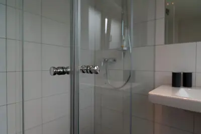 Ein Badezimmer in der Unterkunft Relaxed Urban Living - Aparthotel und Boardinghouse