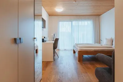 Ein Bett oder Betten in einem Zimmer der Unterkunft Gästehaus Gritsch