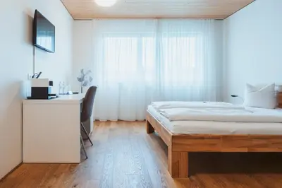 Ein Bett oder Betten in einem Zimmer der Unterkunft Gästehaus Gritsch