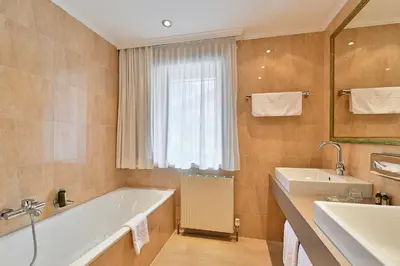 Ein Badezimmer in der Unterkunft Hotel Garni Sursilva