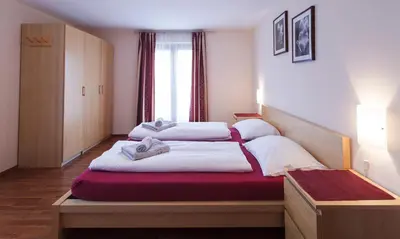 Ein Bett oder Betten in einem Zimmer der Unterkunft Haus Angelika