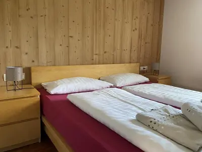 Ein Bett oder Betten in einem Zimmer der Unterkunft Haus Angelika