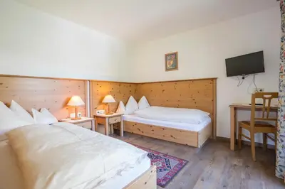 Ein Bett oder Betten in einem Zimmer der Unterkunft Appartements Spullersee